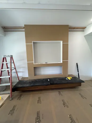 A framed media niche and lower opening progressing to panel cladding, view 2.