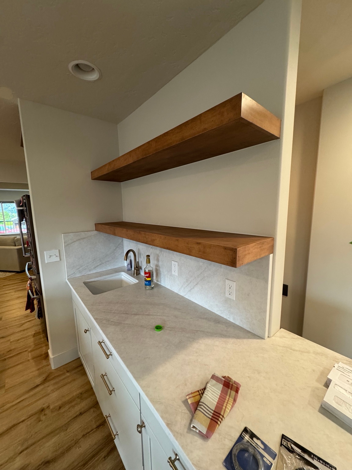 Floating shelf edges and mounting detail