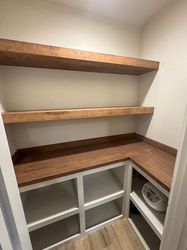Floating wood shelves and matching pantry countertop